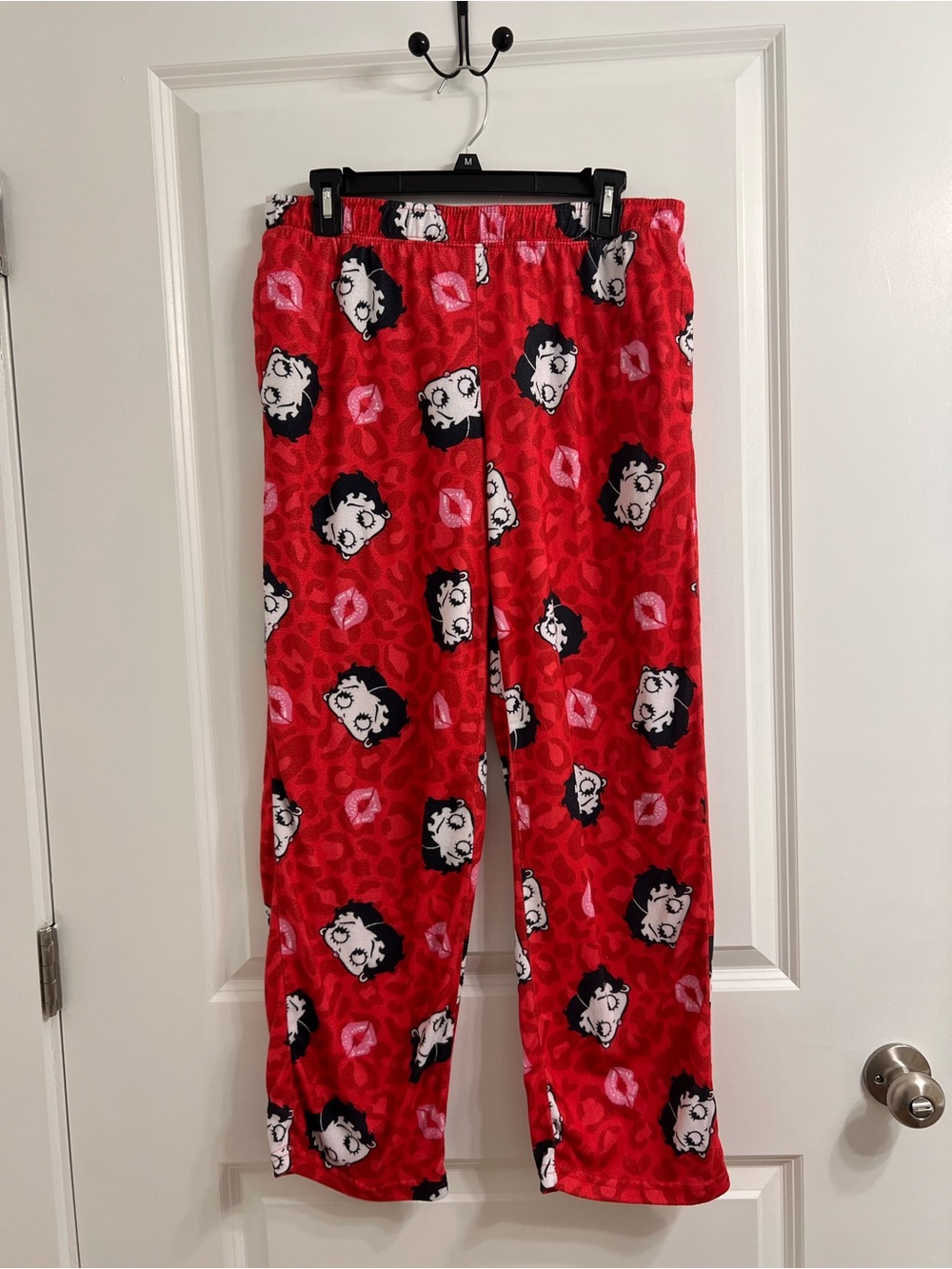 Betty Boop red pajama pants with Betty Boop faces and pink lips size M